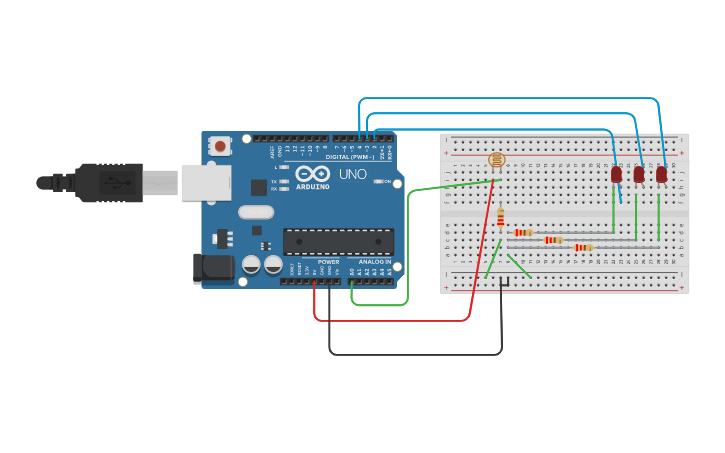 Circuit design encendido de 3 leds con fotorresistencia NICO - Tinkercad